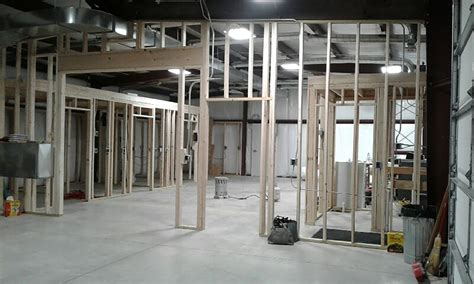 making a wood facade for metal box|wood framing inside metal building.